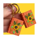 Kolczyki książki ze słonecznikiem